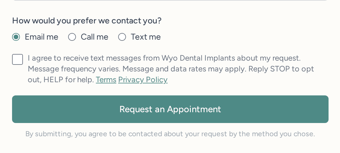 Close-up of the form's lower section as it first loads: the unchecked text-message consent checkbox with its full disclosure and its Terms and Privacy Policy links, above the submit button