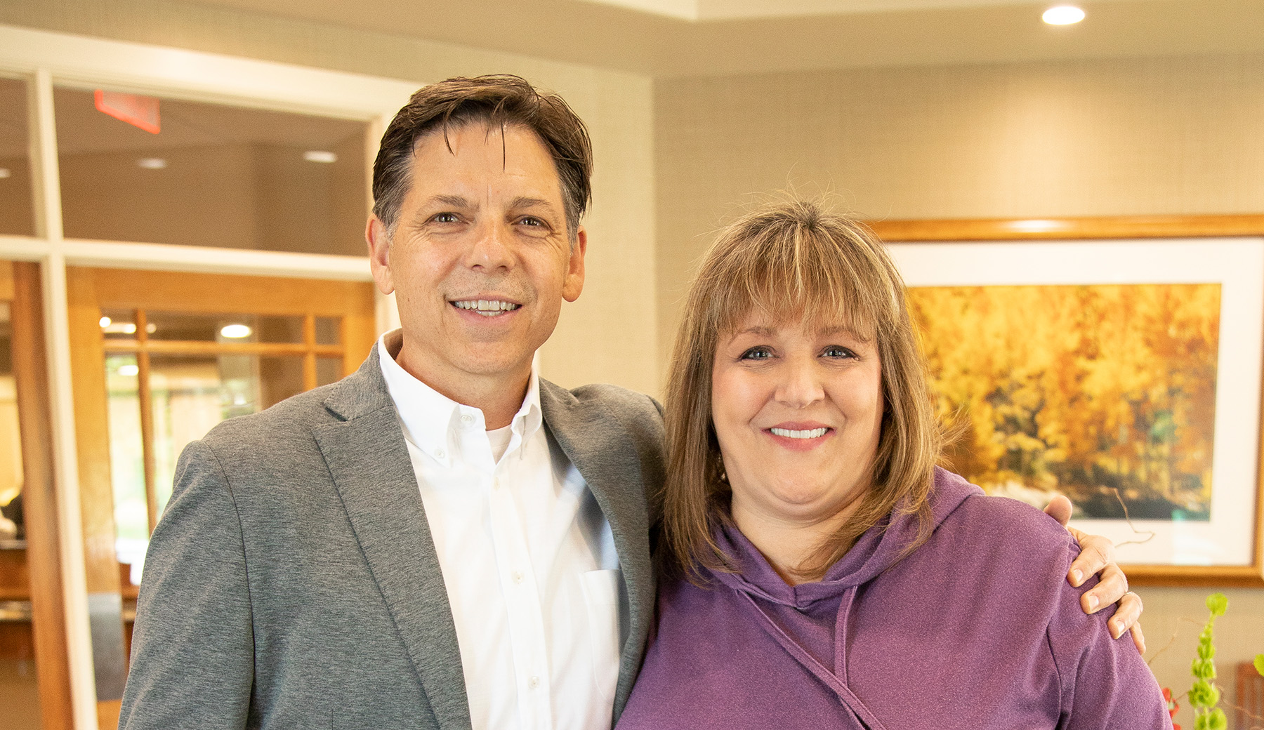 Dr. Youmans talking with a Wyo Dental Implants patient