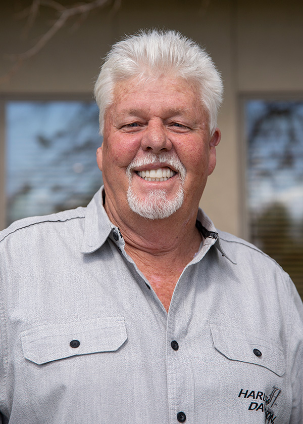 Wyo Dental Implants patient showing his new fixed teeth