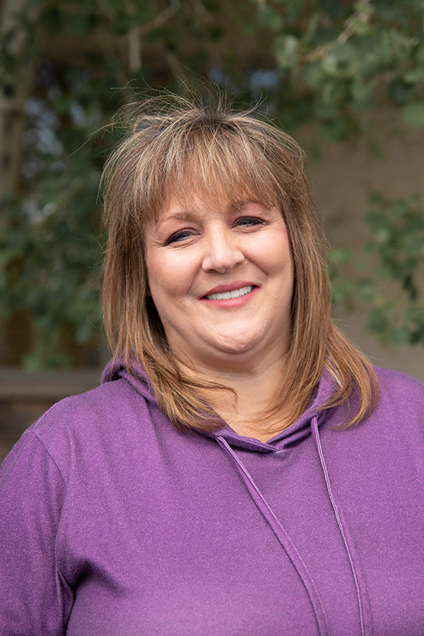 Wyo Dental Implants patient smiling confidently after treatment