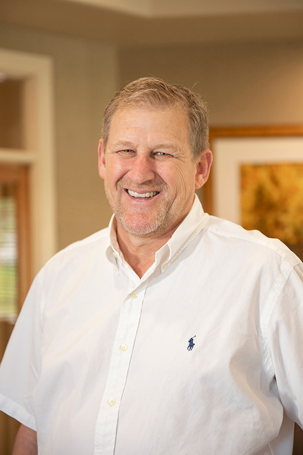 Patient portrait after implant treatment at Wyo Dental Implants