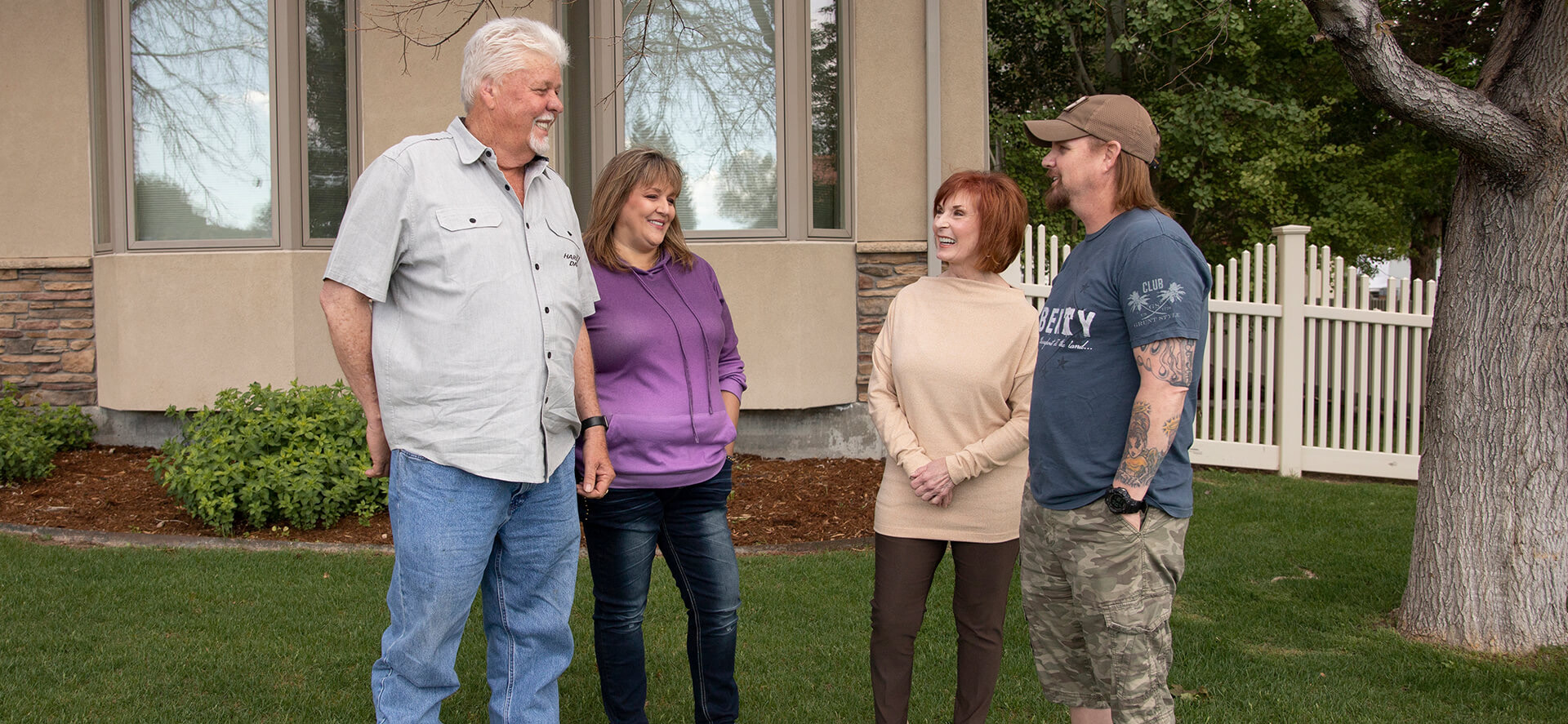 Four Wyo Dental Implants patients talking outside the Casper office